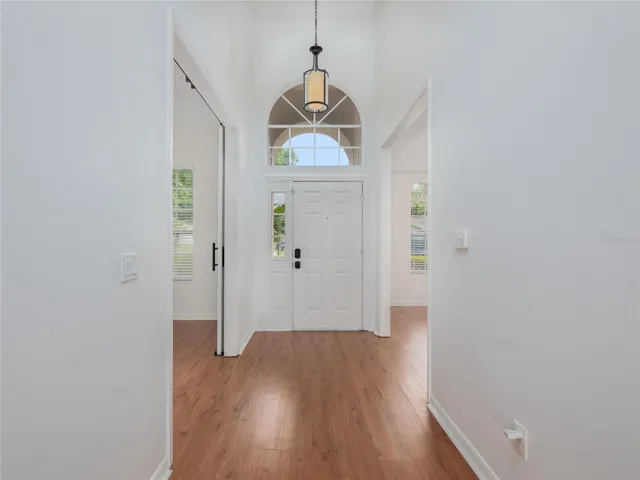 Large windows fill the room with natural light.