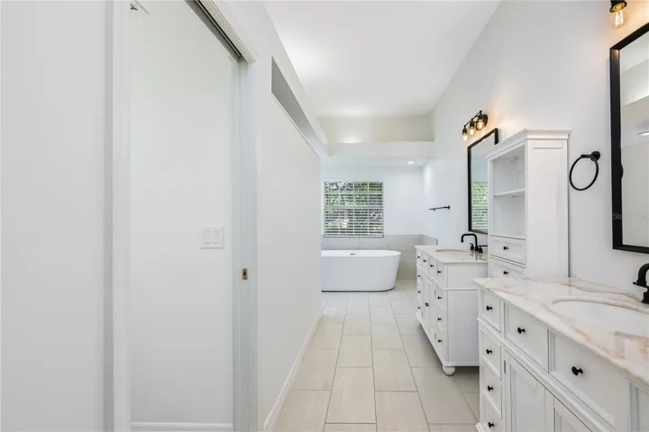 Separate vanities in the primary suite.
