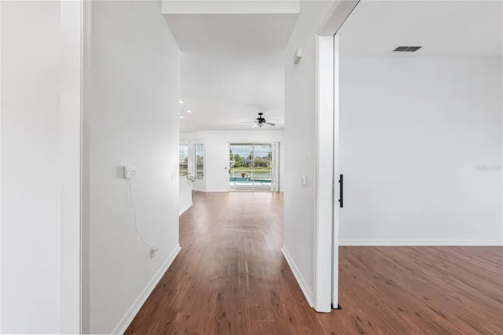 Guests will love the pool and water view as they enter.