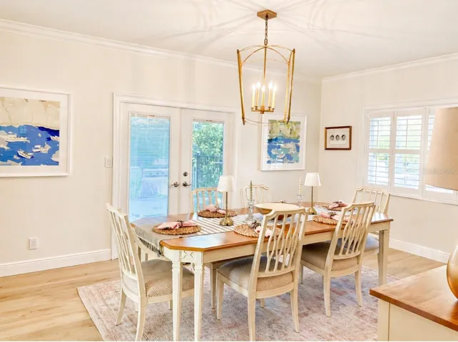 Formal dining room opens to outdoor patio and grilling area.
