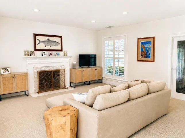 Family room with wood burning fireplace