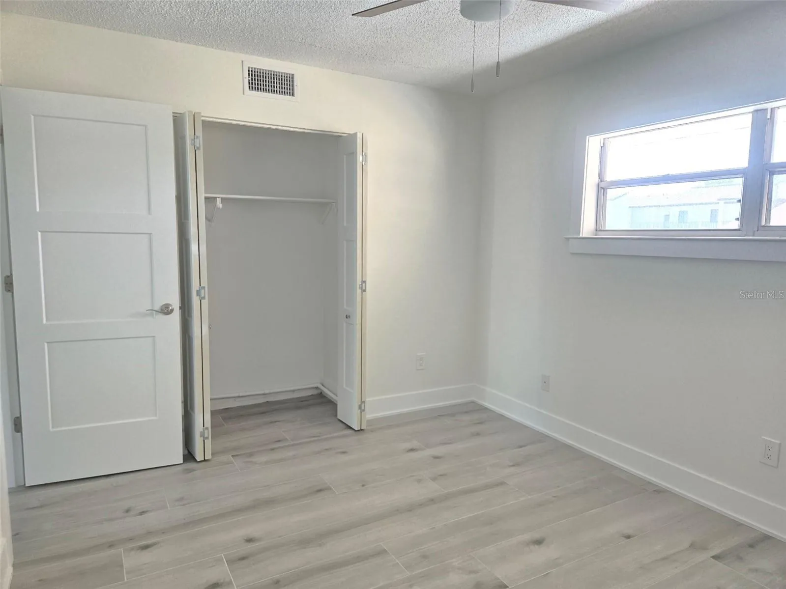 Guest Bedroom with Closet opened