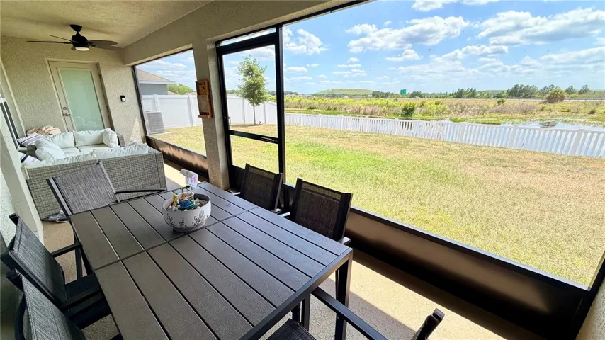 Long covered patio with water view