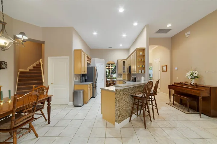 View of peninsula eating area and breakfast nook.