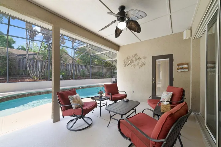 View of covered  and screened in back patio.