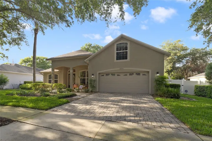 Two car garage and paver driveway