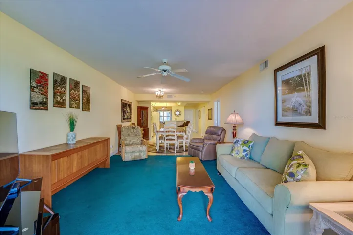 An open-concept layout connects the living and dining areas, creating a cohesive space perfect for everyday living and gatherings.