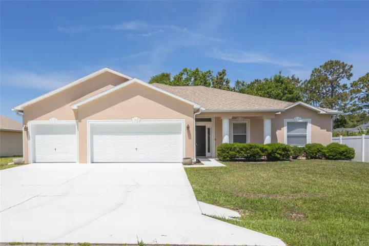 Three car garage. Exterior fresh paint