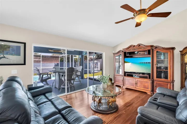 Stunning Brazilian cherry hardwood flooring flows throughout~