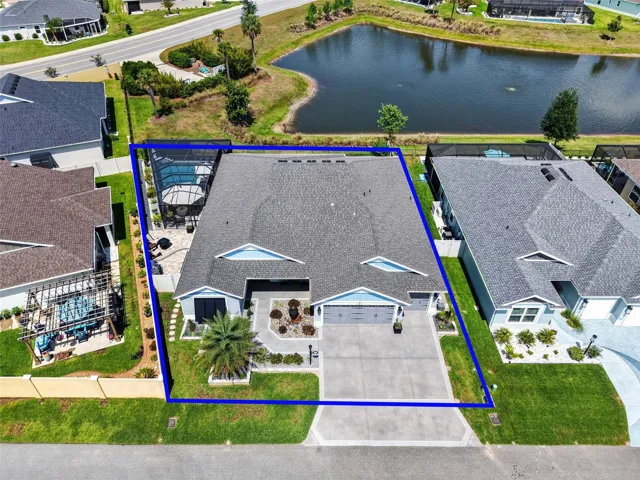 Aerial Front Elevation with Property Lines, Swimming Pool, and Water Views