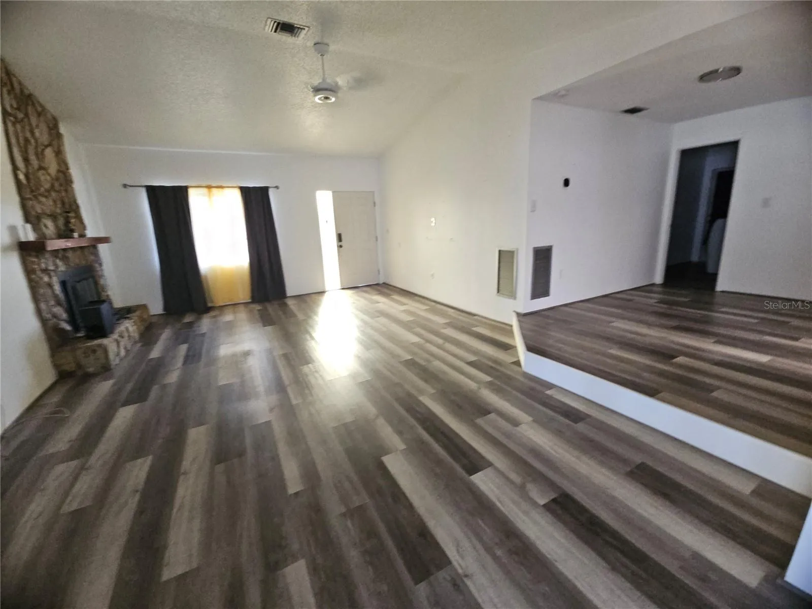 View of Living Room and Kitchen from Florida Room Doorway