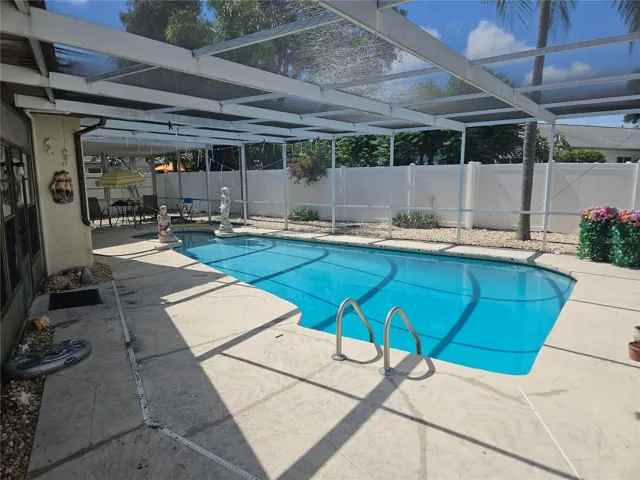 Pool with additional space with Table and chairs provided
