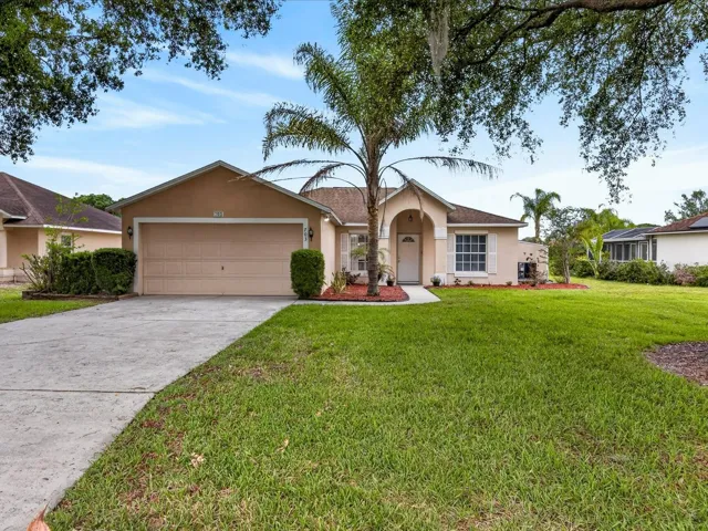 Front of the home with extra long driveway