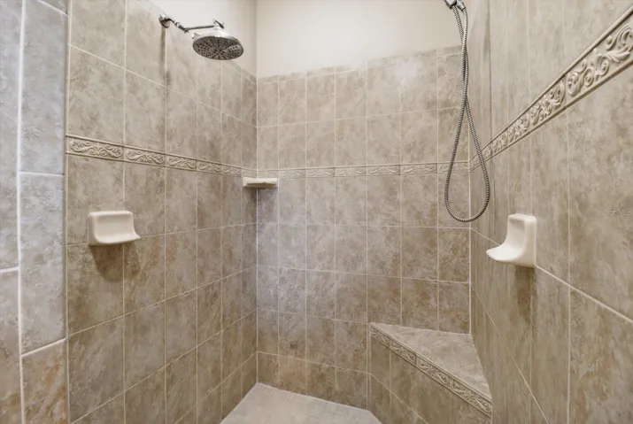 Walk in Tiled Shower w/ Corner Seat & Handheld Showerhead