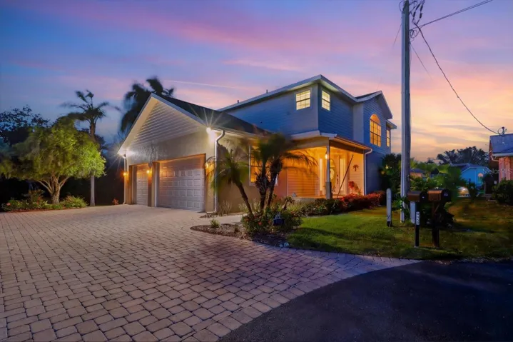 3 Car Garage w/ Pavered Driveway
