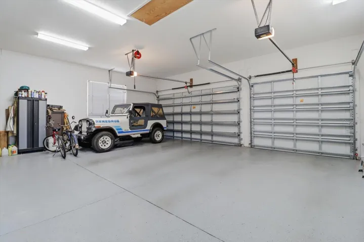 3 Car Garage w/ Epoxy Floor, Large Storage Closet & Attic Flooring for Storage