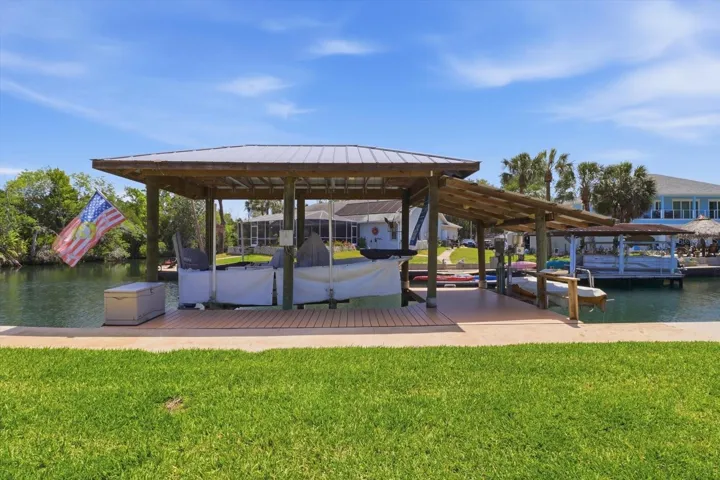 2 Covered Lifts one for Kayak/Jet Ski 1,500lb Capacity & the Other is a Boat Lift 8,000lb Capacity