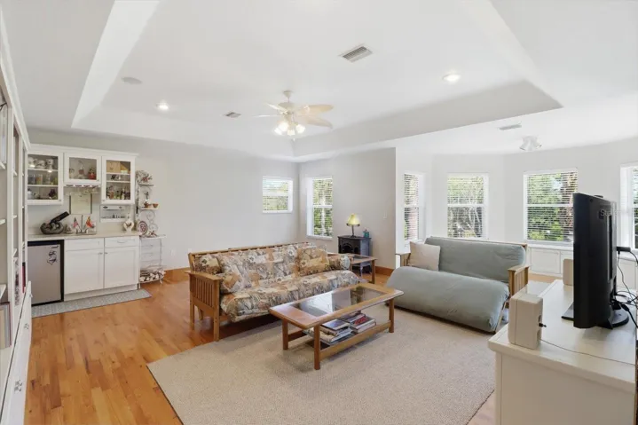 HUGE 26'x20' Family/Rec Room w/ Tray Ceiling & Solid Oak Flooring