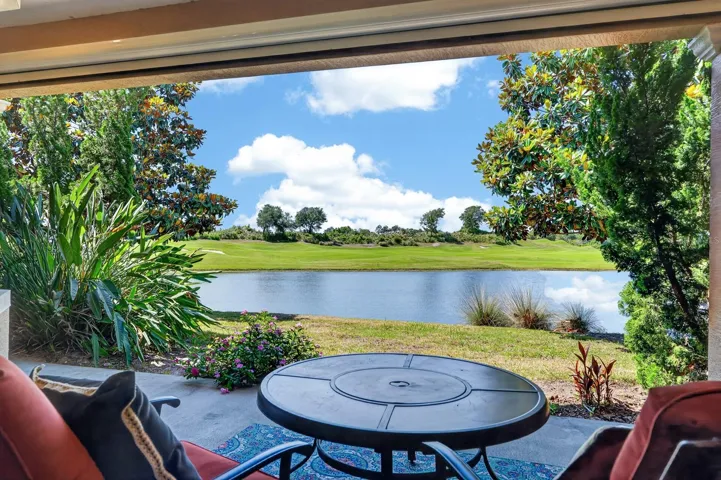 Covered Patio with water and golf course view