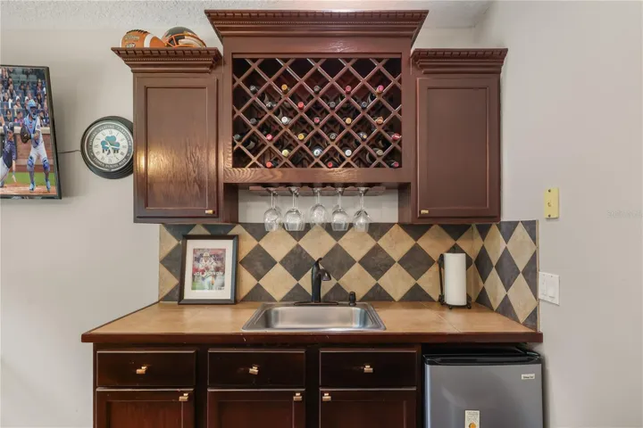 SINK, WINE STORAGE AND FRIDGE