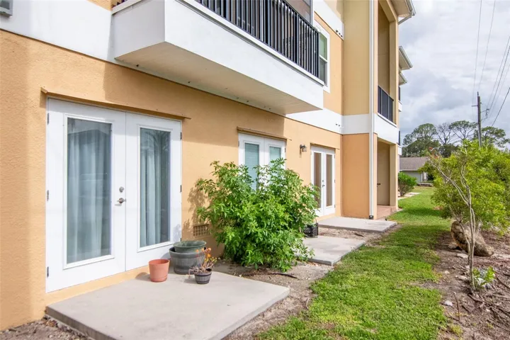 French doors off of the bonus room . Prefect for a BBQ space