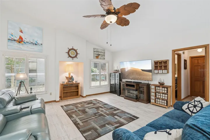 Soaring vaulted ceilings and open layout create a bright, expansive main living space