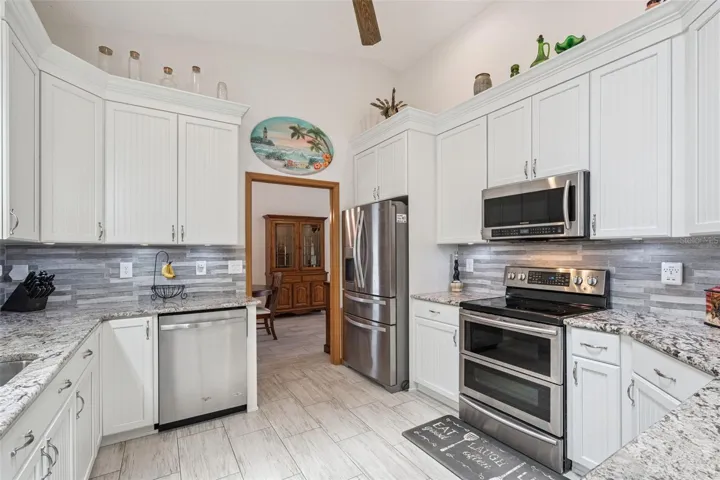 fully updated kitchen with modern finishes and functional workspace
