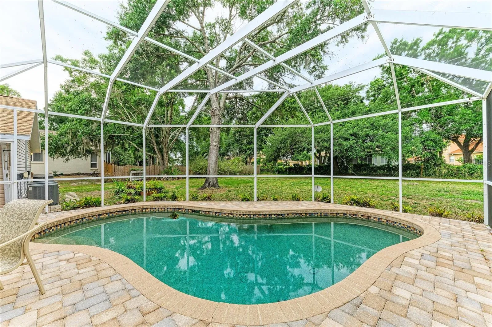 Lanai with PebbleTec pool and paver deck