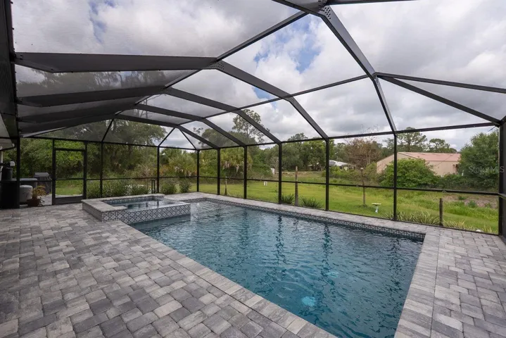 pool area overlooking private back yard