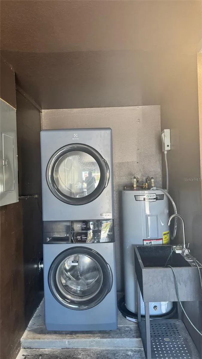 Full Sized Brand New Stacked Washer and Dryer....saves floor space