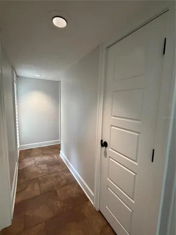 Hallway leading to Bedrooms with Storage Closet