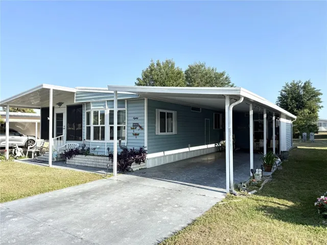 Covered Carport and Storage Area