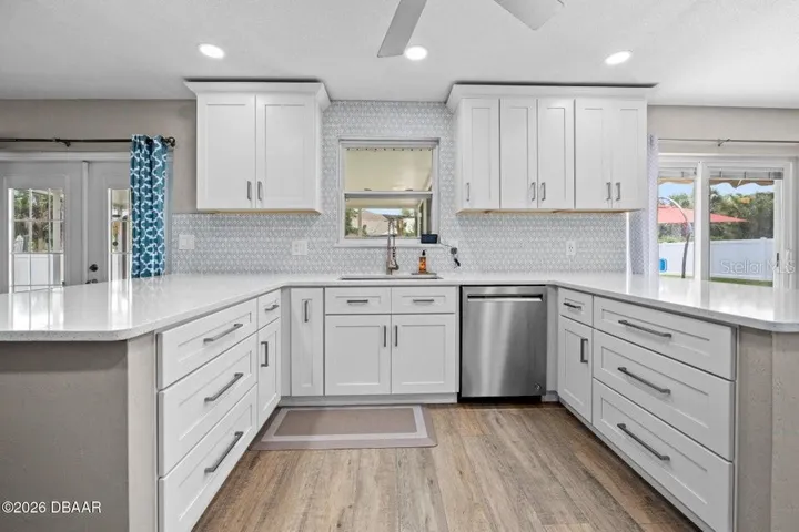 Kitchen with Lots of Storage Space and Tile Backsplash