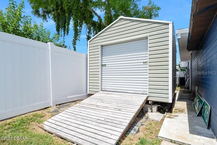10x14 Shed with Ramp and Roll Up door
