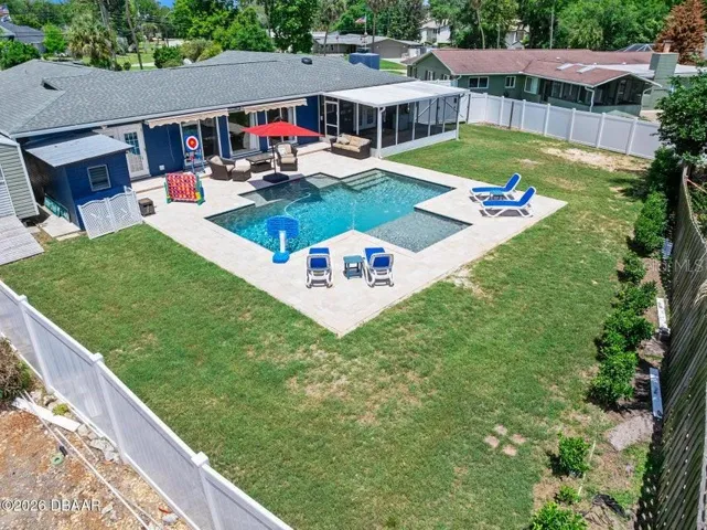 Huge Fenced Backyard with Pool House and Shed