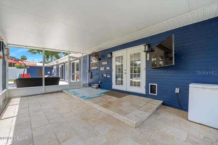 Screened Lanai with French Doors to Family Room