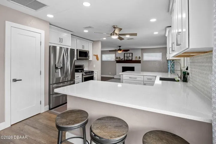 Newer Kitchen with Quartz Counters and Pantry