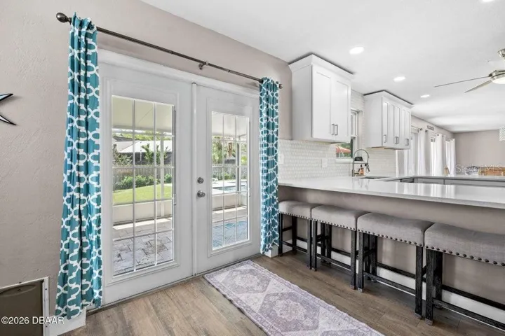French Doors to the Screened Lanai and Pool