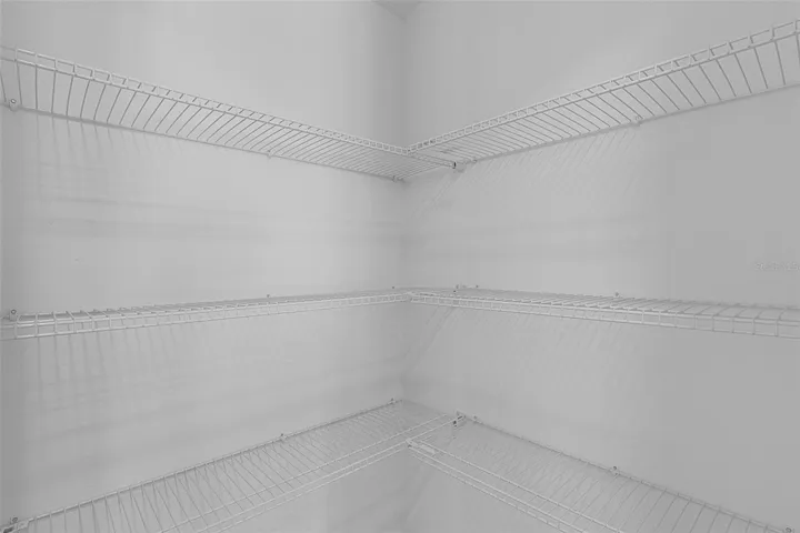 Walk-in corner pantry in the kitchen