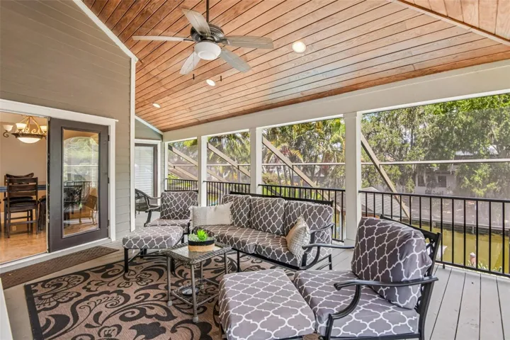 COVERED PATIO OVERLOOKING CANAL AND POOL