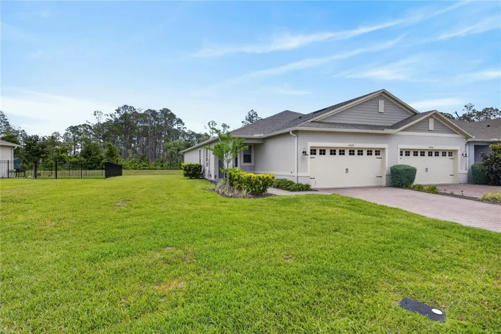 Exterior Front on  pond lot