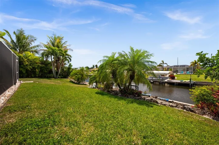 Back yard has lots of space and waterfront views