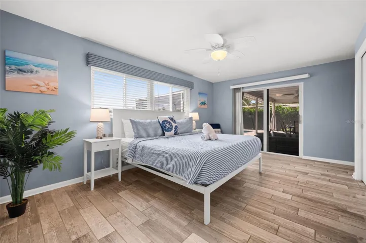 Primary bedroom just steps from the pool