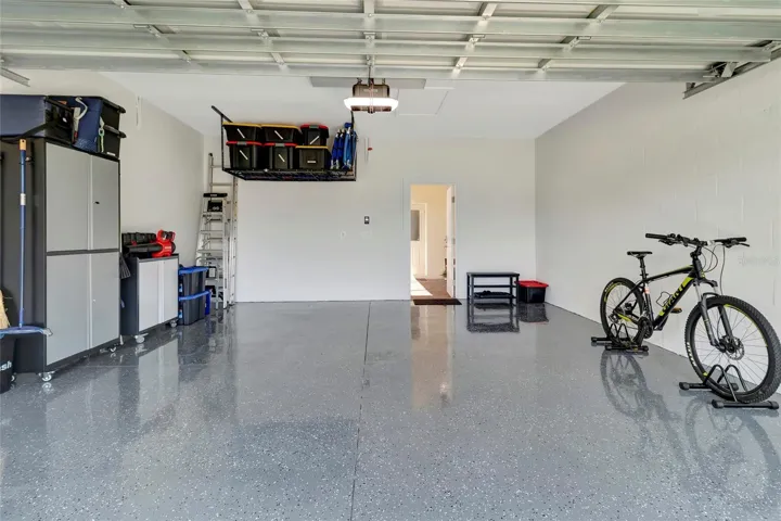 Garage with Upper Storage and Epoxy Floors