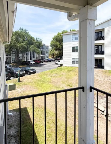 Balcony view overlooks pond