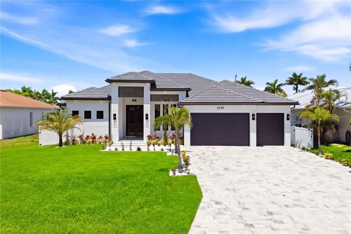 BRIGHT & OPEN LAYOUT features 48x48 SPANISH PORCELAIN TILE FLOORING, MATTE FINISH throughout, SLEEK & UPSCALE AMBIANCE!