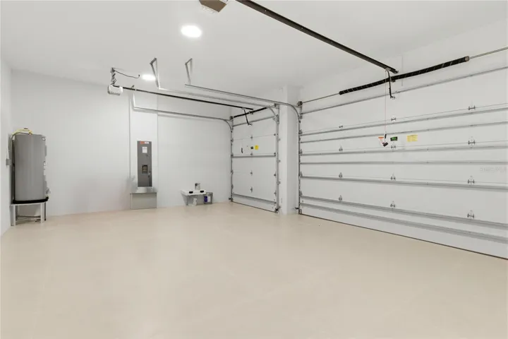 3-CAR GARAGE w/ INSULATED DOORS for HOME ENERGY EFFICIENCY