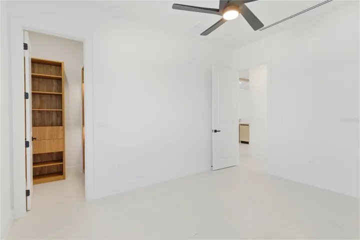 Spacious fourth guest bedroom offering comfort and flexibility for family, visitors, or a private workspace.
