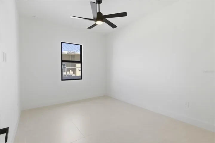 Versatile third guest bedroom ideal for visitors, hobby room or second office!