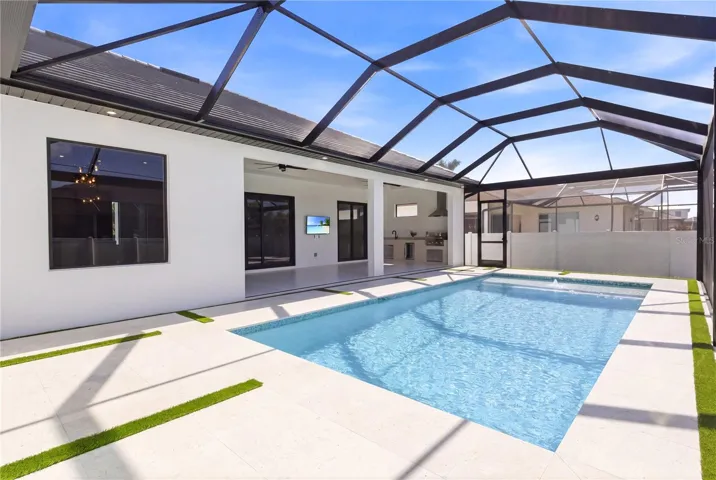 Screened-in pool area offering a private, resort-style setting :)
